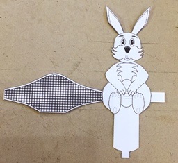 Free downloadable Easter Bunny Easter Egg holder for Schools and Easter Craft projects.