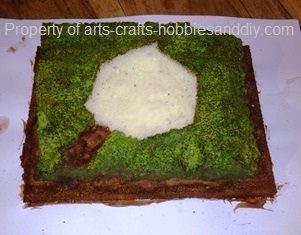 Applying a grass effect to a WWII diorama.
